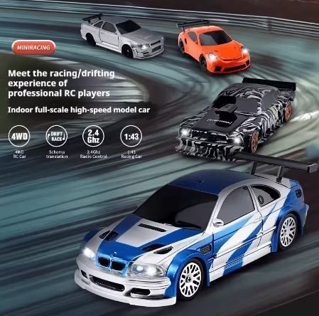 Радіокерована іграшкова модель BMW, &laquo;Drift Сar&raquo; 1:43 з пультом і аксесуарами 2001 фото