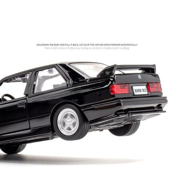 Модель автомобіля BMW M3 1987, масштаб 1:43, чорна, мініатюрна БМВ M3 E30 1987 2008 фото