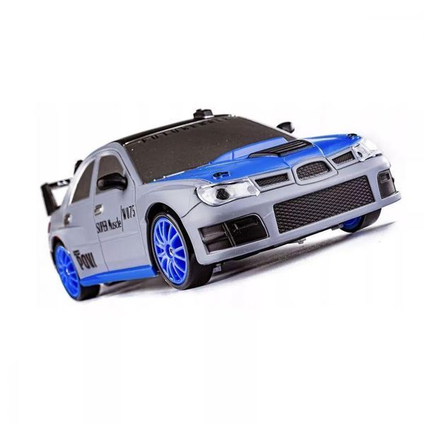 Радиоуправляемая игрушечная Дрифт машинка Subaru, "Racing Rally R/C" 1:43 с пультом и аксессуарами 2017 фото