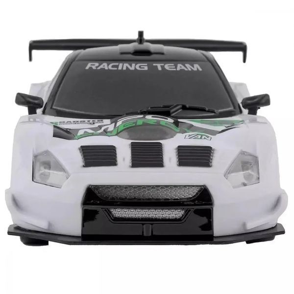 Радиоуправляемая игрушечная Дрифт машинка Nissan GT-R 4WD, "Racing Rally R/C" 1:43 с пультом и аксессуарами 1671 фото
