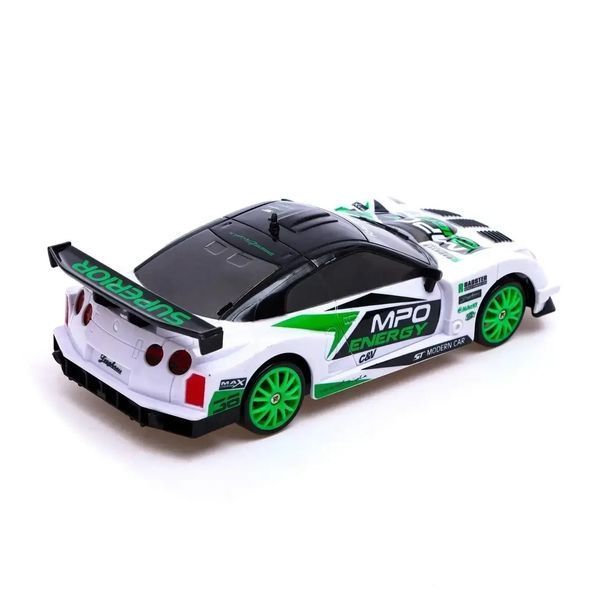Радиоуправляемая игрушечная Дрифт машинка Nissan GT-R 4WD, "Racing Rally R/C" 1:43 с пультом и аксессуарами 1671 фото
