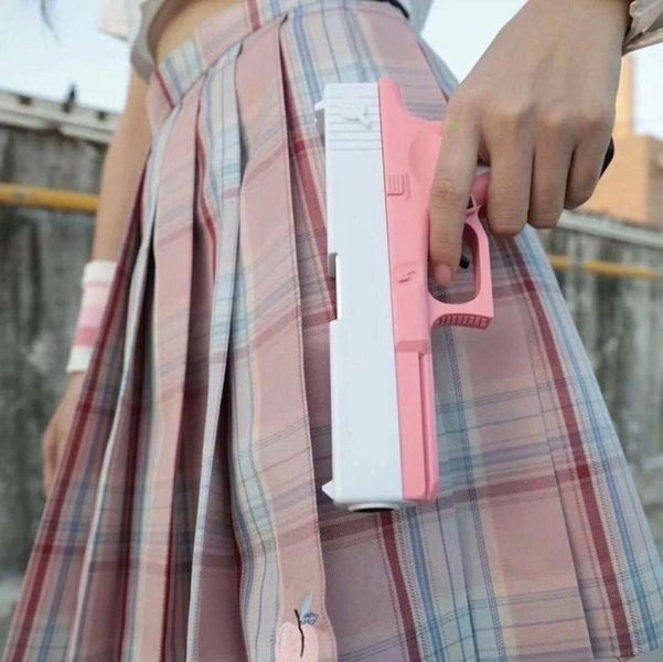 Пистолет детский игрушечный GLOCK с безопасными пулями, фирменным глушителем и поролоновыми патронами Розовый 2022 фото