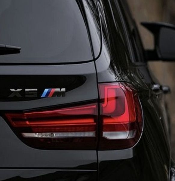 Шильдик логотип эмблема BMW Х5 M, стильный аксессуар для тюнинга багажника вашего БМВ, чёрного цвета. 1986 фото
